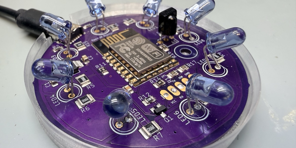 Assembled OpenIRBlaster PCB showing ESP-12F module and 360-degree IR LED arrangement